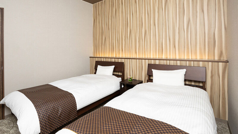 愛昇殿レクストの杜 柏森 ゆっくりお休みいただけるベッドルーム